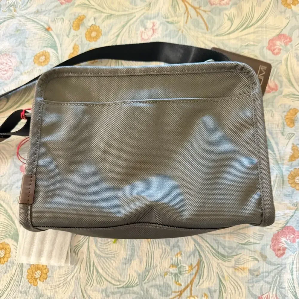 NEW Tumi GEN 4.3 EAST WEST 9.0” Sling Crossbody - CASTLEROCK GRAY & BROWN